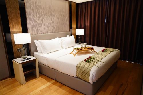 Postel nebo postele na pokoji v ubytování Imperial Residences KLCC - MK HOME