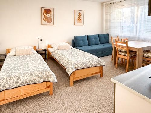 Кровать или кровати в номере ViVi Apartments