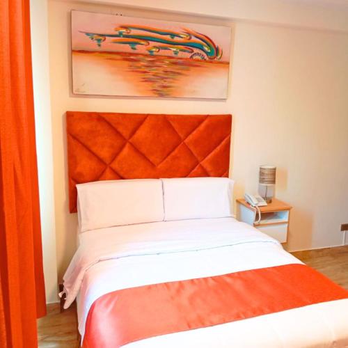 Ένα ή περισσότερα κρεβάτια σε δωμάτιο στο Hotel Soul Mate Inn