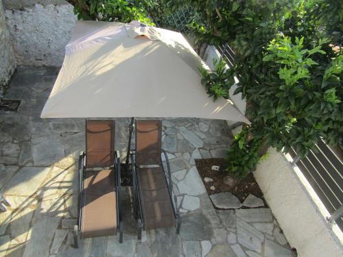 Un patio o zona al aire libre en Akis Suite