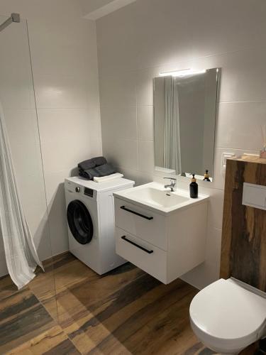 Ένα μπάνιο στο Solny apartament