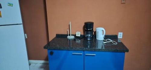 A cozinha ou kitchenette de Studios & House with beautiful beach front view