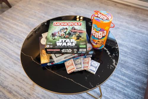 a black table with food and snacks on it at Views of Lone Peak and mini golf in Draper