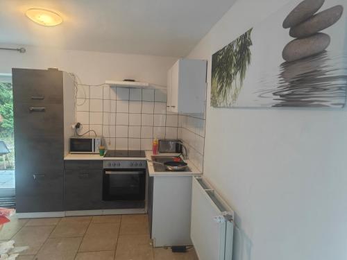 Kuchyň nebo kuchyňský kout v ubytování Work and Stay Haus 4 Betten Terasse Küche nähe Geleen,Geilenkirchen,Heinsberg,Alsdorf