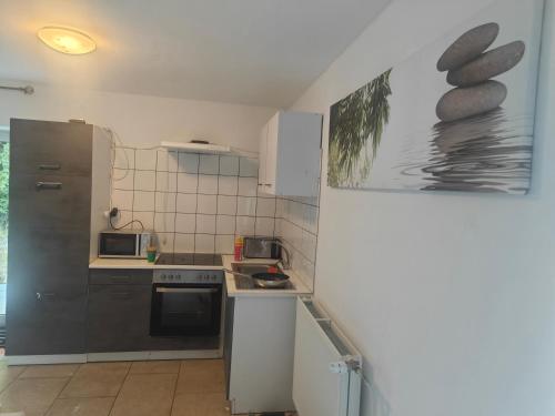 Kuchyň nebo kuchyňský kout v ubytování Work and Stay Haus 4 Betten Terasse Küche nähe Geleen,Geilenkirchen,Heinsberg,Alsdorf