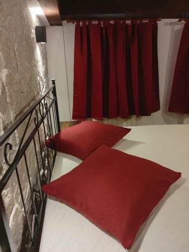 Katil atau katil-katil dalam bilik di Locanda Sarel, intera casa vacanza 4 camere 5 bagni 14 posti letto