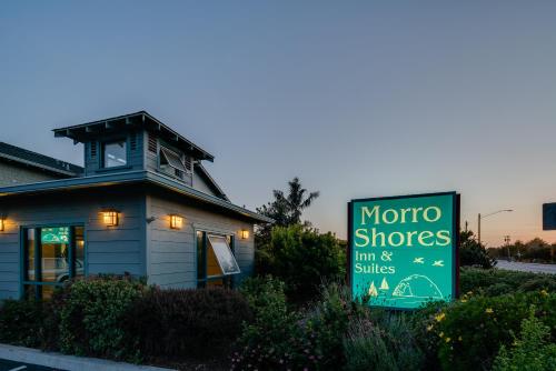 a sign in front of a building with a motor shop at Morro Shores Inn And Suites in Morro Bay