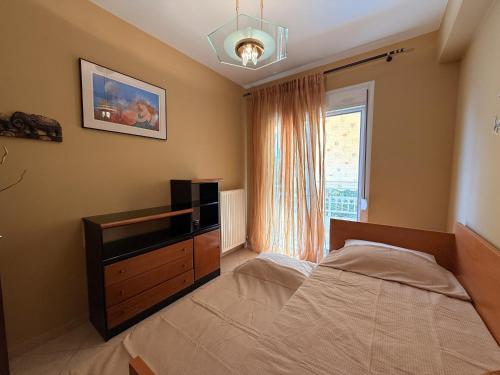 Кровать или кровати в номере M&P Apartment