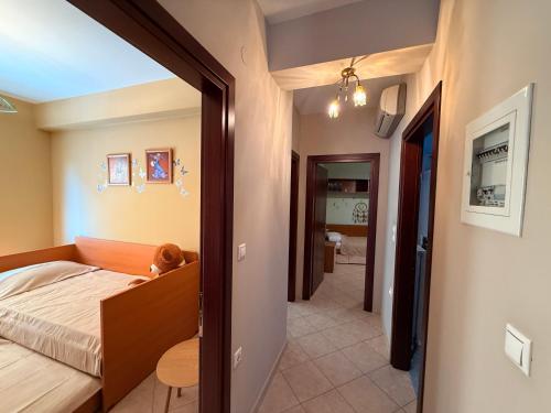 Кровать или кровати в номере M&P Apartment