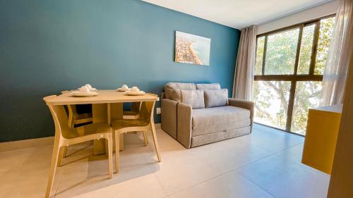 Ruang duduk di Jardins Almare Apart Hotel