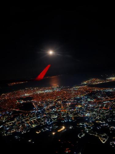 a view of a city at night from an airplane at Olympos Talara by Arzum in Kumluca
