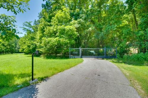 a gate on the side of a road at White River Access and Views Retreat in Gassville! in Gassville
