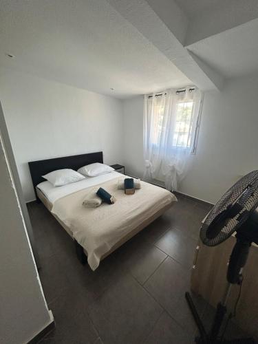 En eller flere senge i et værelse på Apartment