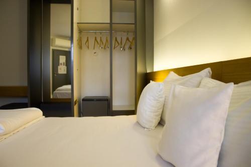 Cama o camas de una habitación en Hotel Silva
