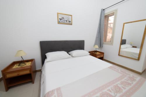 Postel nebo postele na pokoji v ubytování Gentile's home