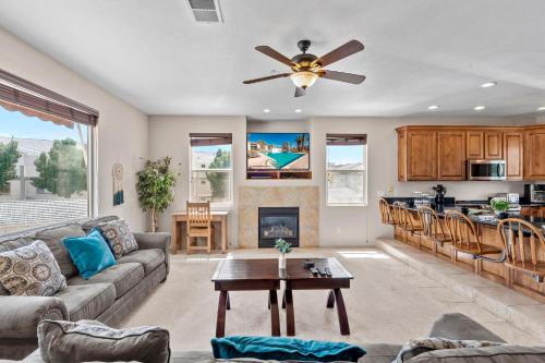 a living room with a couch and a ceiling fan at Las Palmas 1805 Shared Pool and Hot Tub, Great Clubhouse Amenities in St. George