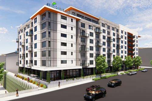 a rendering of a building with cars parked in front at Element Seattle Downtown in Seattle