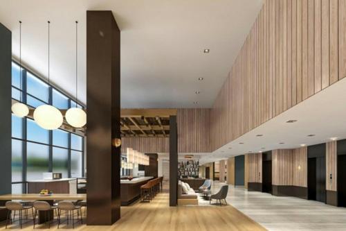 an office lobby with a dining and living room at Element Seattle Downtown in Seattle