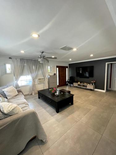 a living room with a couch and a coffee table at House in Redondo Beach 2 bedroom 1 bath in Redondo Beach