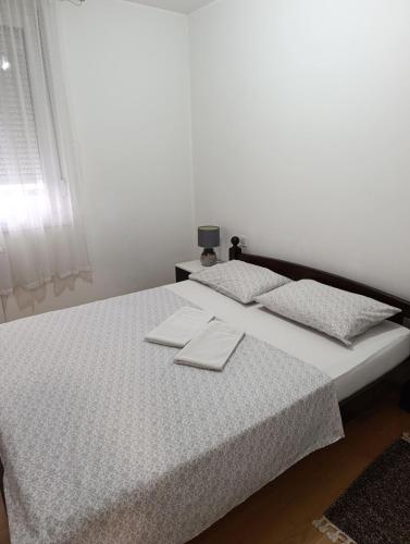 Postel nebo postele na pokoji v ubytování Apartman Phoenix