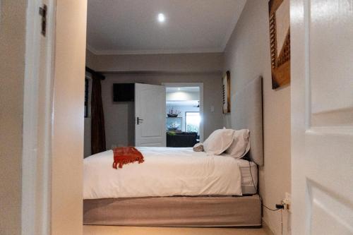 Postel nebo postele na pokoji v ubytování Megs Guesthouse