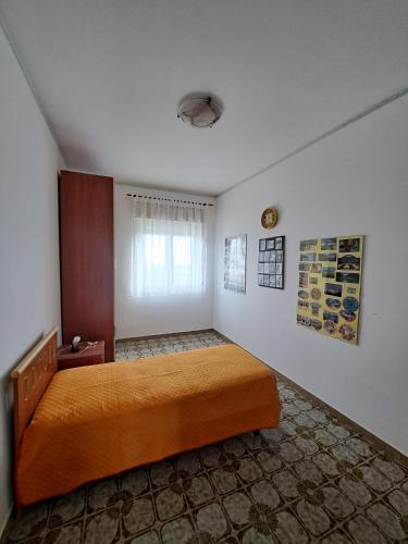 Ένα ή περισσότερα κρεβάτια σε δωμάτιο στο A casa di Roy