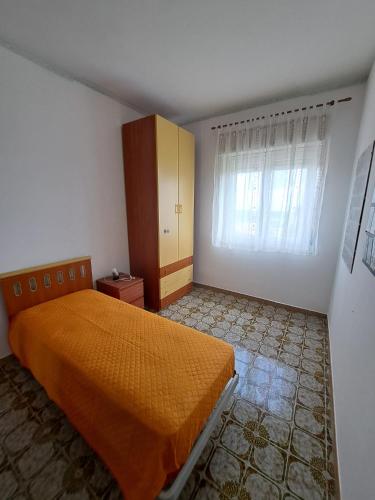 Ένα ή περισσότερα κρεβάτια σε δωμάτιο στο A casa di Roy