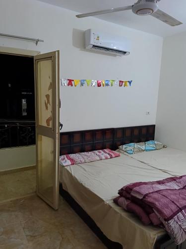 Ένα ή περισσότερα κρεβάτια σε δωμάτιο στο One room apartment