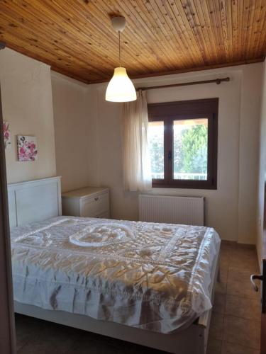 Кровать или кровати в номере Leisure house