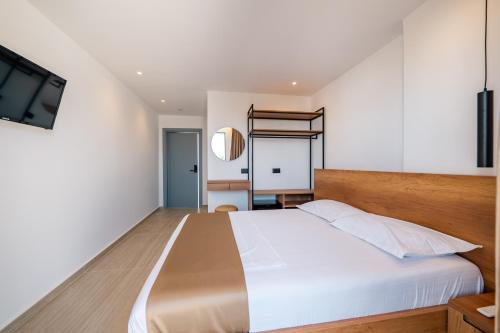 Postel nebo postele na pokoji v ubytování Hotel ENAD