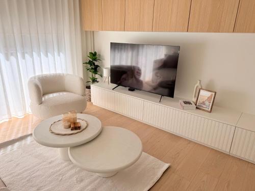 Una televisión o centro de entretenimiento en Studio Nacre Knokke