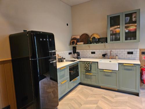 Una cocina o cocineta en Hella - Riverbank