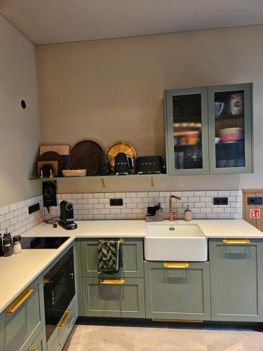 Una cocina o cocineta en Hella - Riverbank
