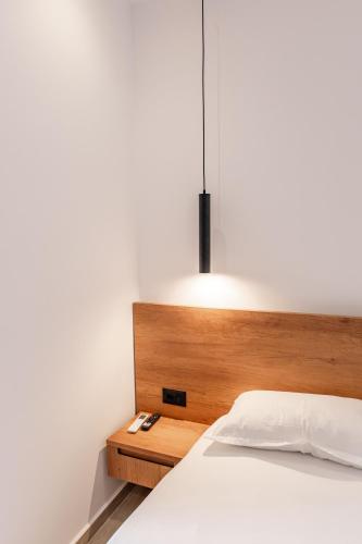 Postel nebo postele na pokoji v ubytování Hotel ENAD