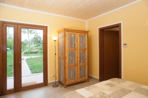 Кровать или кровати в номере Agriturismo Il Cavicchio