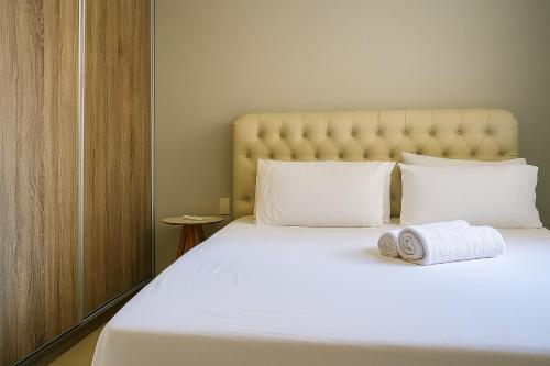 Ένα ή περισσότερα κρεβάτια σε δωμάτιο στο Shows no Serra Dourada. Tudo perto Jd. Goiás / 3Q/ 2 Gar