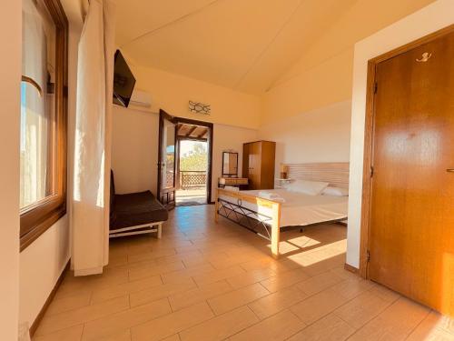 Ένα ή περισσότερα κρεβάτια σε δωμάτιο στο Villa Hacienta