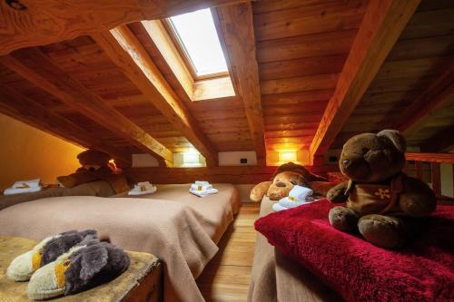 Postel nebo postele na pokoji v ubytování Chalet Maison Felix