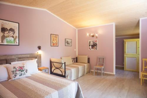 Postel nebo postele na pokoji v ubytování Agriturismo Il Cavicchio