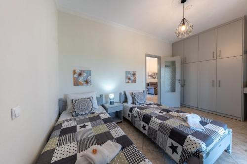 Ένα ή περισσότερα κρεβάτια σε δωμάτιο στο Tereza's charming house