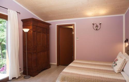 Кровать или кровати в номере Agriturismo Il Cavicchio