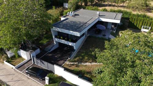 an overhead view of a house with a roof at Rent Your Family Retreat in Novi Sad in Novi Sad