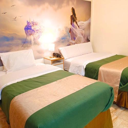 Ένα ή περισσότερα κρεβάτια σε δωμάτιο στο Hotel Soul Mate Inn