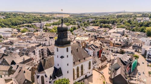 an aerial view of a town with a clock tower at SOON APT Nr 1 in Simmern