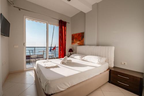 Katil atau katil-katil dalam bilik di Hotel Ble Ble Vlore