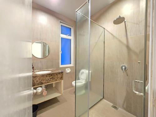Ένα μπάνιο στο Shamrock Beach Villas - Batu Ferringhi