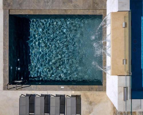 an overhead view of a piano and a painting at Magnificent Crete Villa 4 Bedrooms Villa Ánthos Two Large Private Pools & Jacuzzi Bbq Close To The Beach Rethymno in Prínos