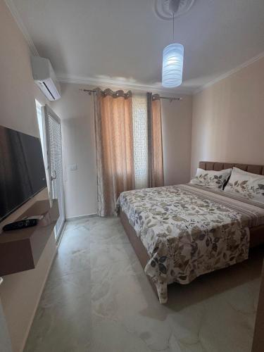 Katil atau katil-katil dalam bilik di Blue Wave Durres Apartment