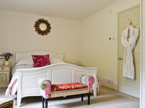 Ένα ή περισσότερα κρεβάτια σε δωμάτιο στο The Downs Barn Lodge