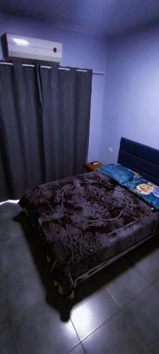 Katil atau katil-katil dalam bilik di Teresita Boutique Home